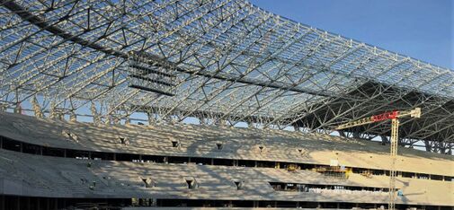 View inside the New Ferenc Puskás Arena in Budapest. There, 15,000 m² of grandstand flooring was coated with MC-Floor TopSpeed flex, the flexible roller coating with crack-bridging properties.
